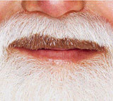 Santa Claus se manchó los bigotes con leche chocolatada